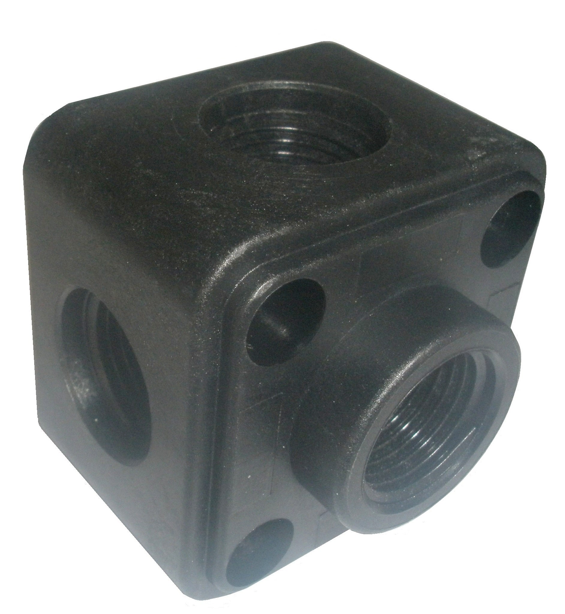 Black metal block with threaded holes on a white background