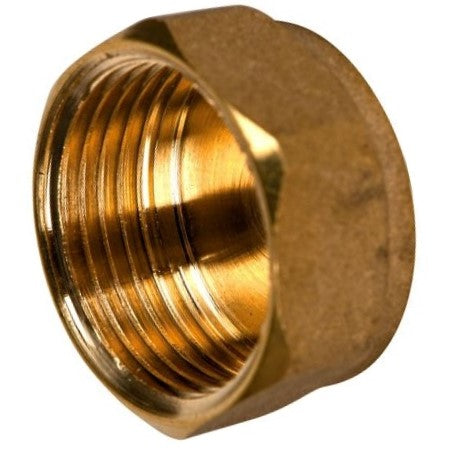 Brass female pipe fitting on a white background
