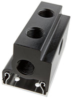 Black metal component with multiple threaded holes on a white background