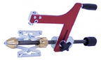 Mechanical tool with red and silver components on a white background